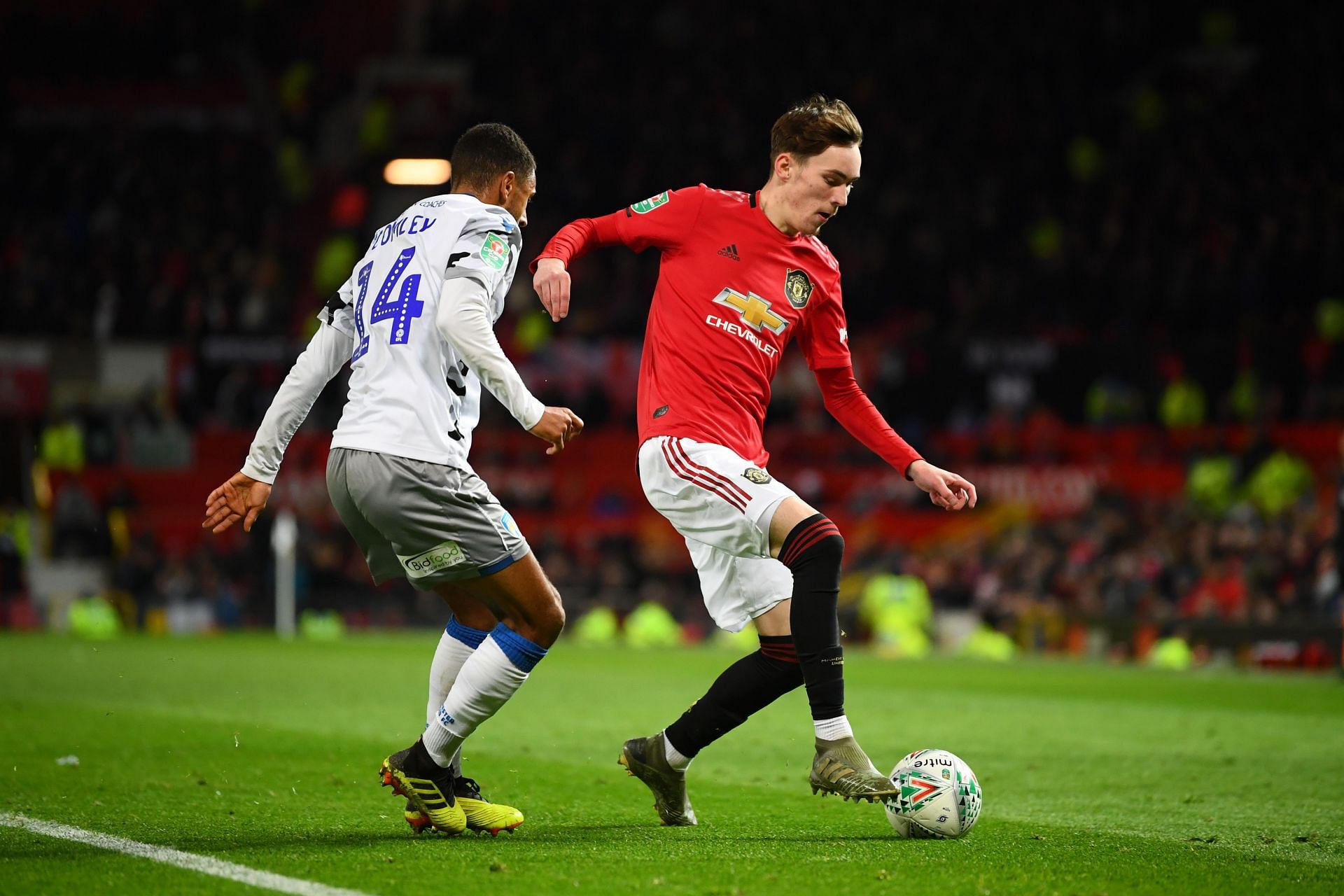 Manchester United's James Garner (right) in action during the Carabao Cup